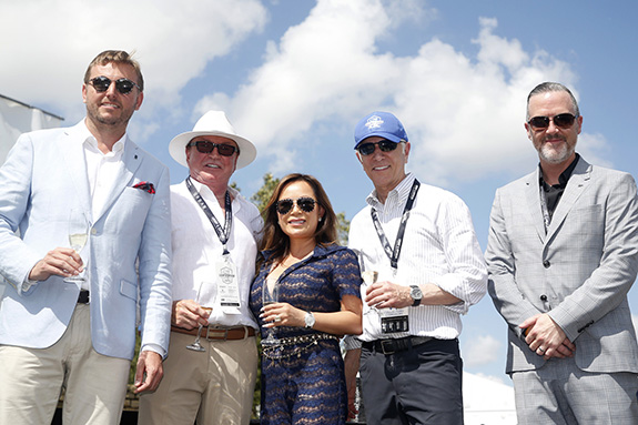 Left to right: Rolls-Royce Motor Cars NA president Martin Fritches; Dr. Doug & Molly Barnes; Park Place Dealerships chairman Ken Schnitzer; Park Place Premier Collection GM Heath Strayhan.