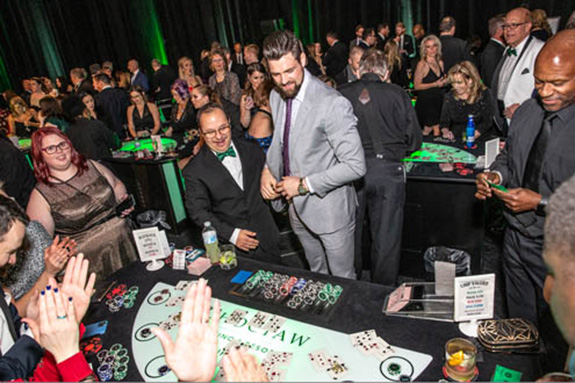 Dallas Stars captain Jamie Benn deals blackjack